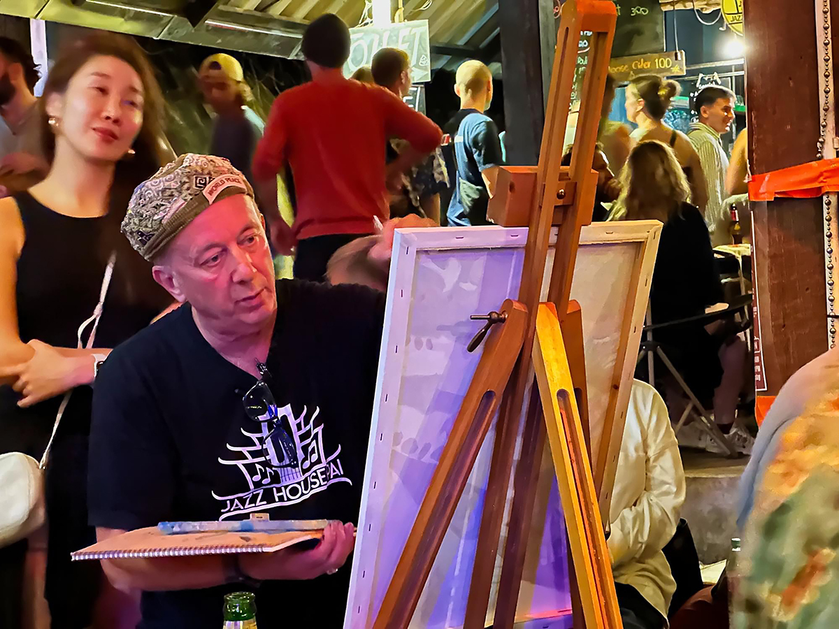 Stephen Shooster doing a live concert painting